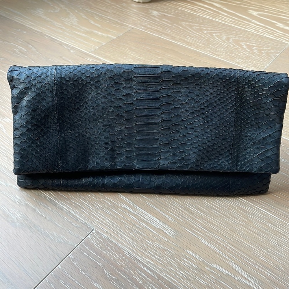 Black python fold-over clutch